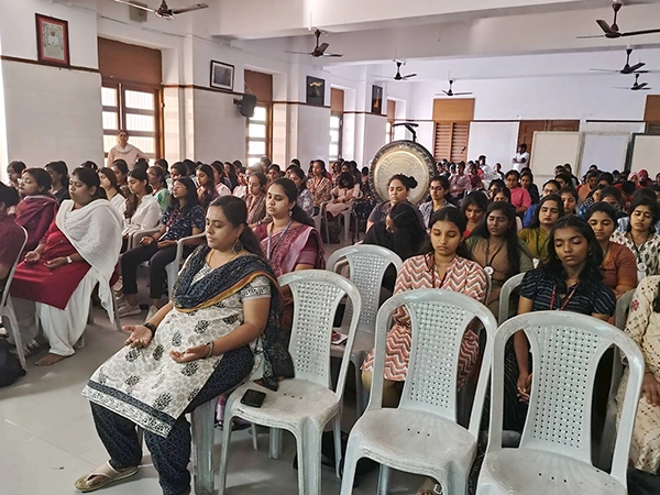 Professional wellness therapists guide interactions during campus wellness session at Stella Maris