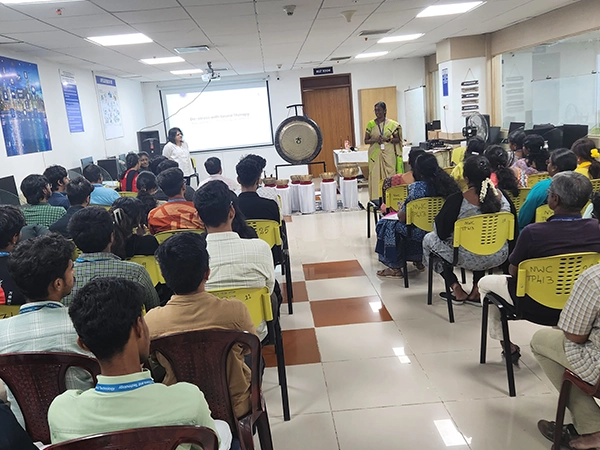 An introductory yoga session arranged on the lawn during orientation for college students at SRM.
