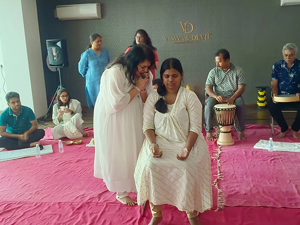 Organizers guide the corporate teams through sound healing to reduce burnout and increase focus.