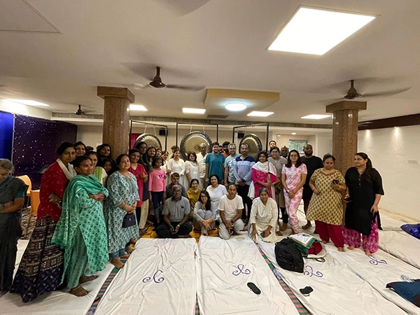 Calm participants and harmonious environment at the Satvat Dhwani Nidra group session
