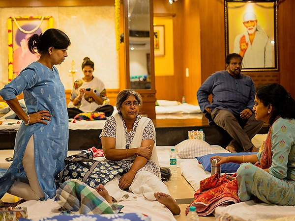 Participants gently releasing emotions through healing sound therapy and mindful awareness