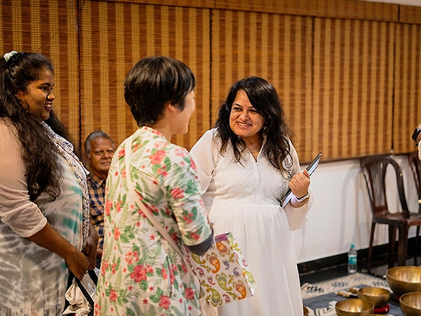 An expressive moment of energy release during a transformative sound healing practice