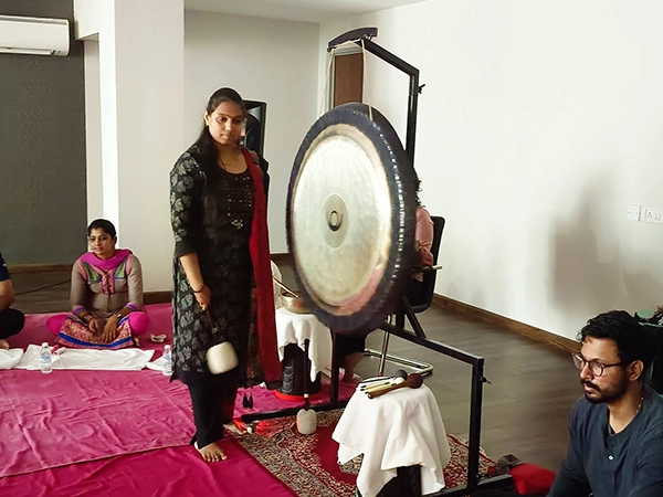 Therapists lead evening gong healing to help release accumulated stress & prepare for restful sleep
