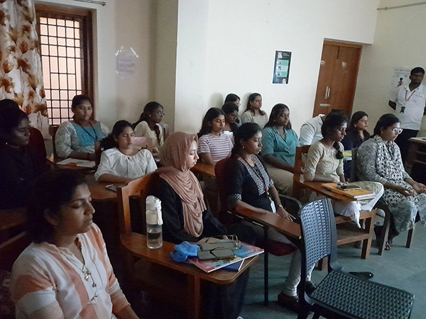 Students are attending the mindfulness yoga session workshop at the University of Madras campus.