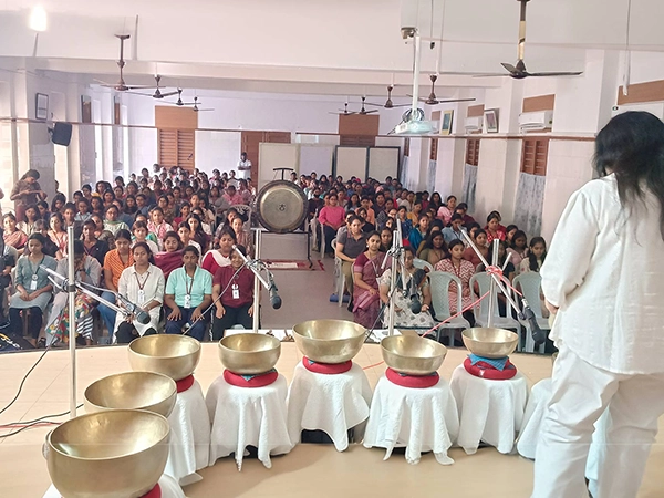 A campus-based wellness therapy activity taking place on outdoor grounds of Stella Maris campus