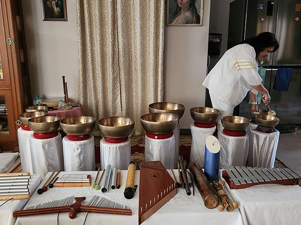 Experts guide full day immersive sound bath healing session using gongs and meditative techniques