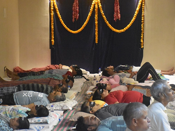 Gong bath session by Dhiwani Nidra helping people achieve a stress-free and calm mind.