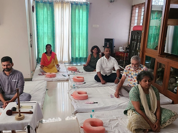 Trainers conduct full day gong meditation session to deepen mindfulness, clarity & mental awareness