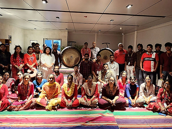 Group picture at resonance healing event capturing unity, peace, and shared calm gathering.