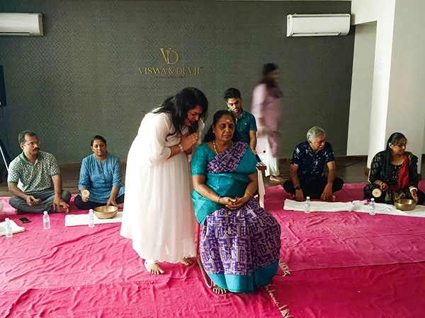 Trainers conduct guided gong meditation to improve self reflection, focus, and emotional balance.