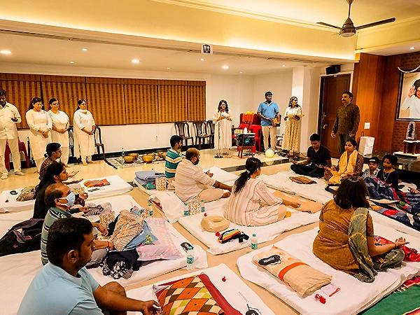 A peaceful healing room arranged with care, inviting calm and therapeutic energy exchange