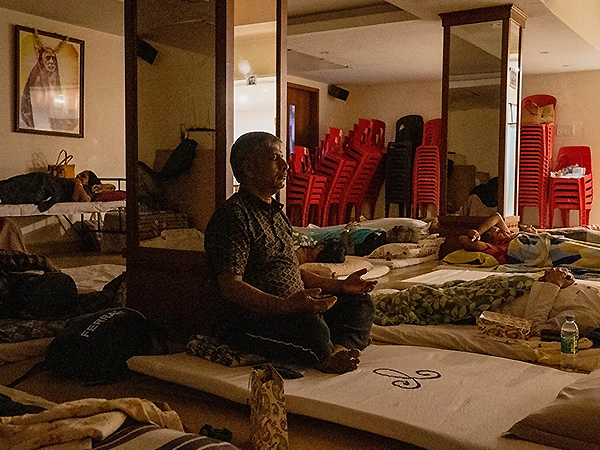 Individual reaching a state of pure bliss and inner peace during guided meditation session