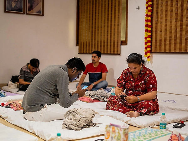 A meditative family sitting together in peaceful harmony during a group mindfulness session