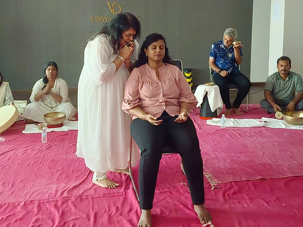 Facilitators guide participants in mindful gong immersion to build the clarity, calm and inner peace