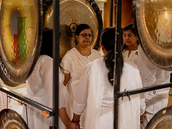 Immersive sound bath session where participants dive into stillness and present-moment clarity