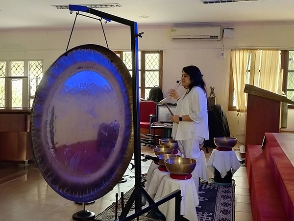 An open yoga class conducted at Loyola by Satvat, encouraging group participation and relaxation.