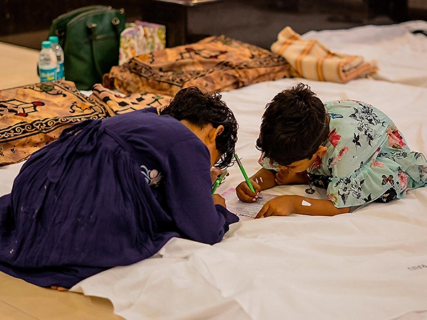 A peaceful sound room set with gongs, creating an atmosphere of balance, stillness, and calm