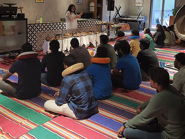 Present circle facilitates mindful group healing, meditation, and connection energy.