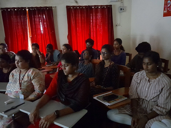 Students take part in a calming red-room yoga session at University of Madras campus effectively.