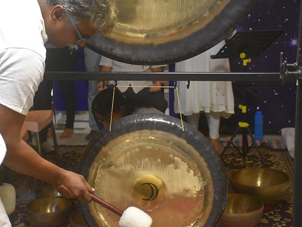 Restorative gong bath therapy session aimed at healing and deep relaxation of mind and body.