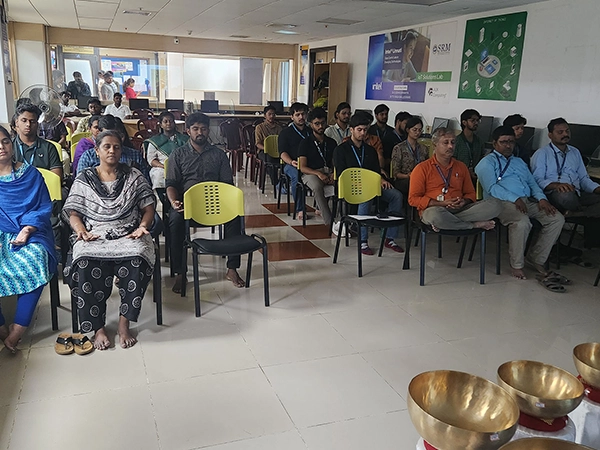 A sample yoga session coordinated to introduce new students to basic wellness movements on SRM .