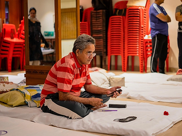 A healing practice captured in a serene setting with calm, seated meditative postures