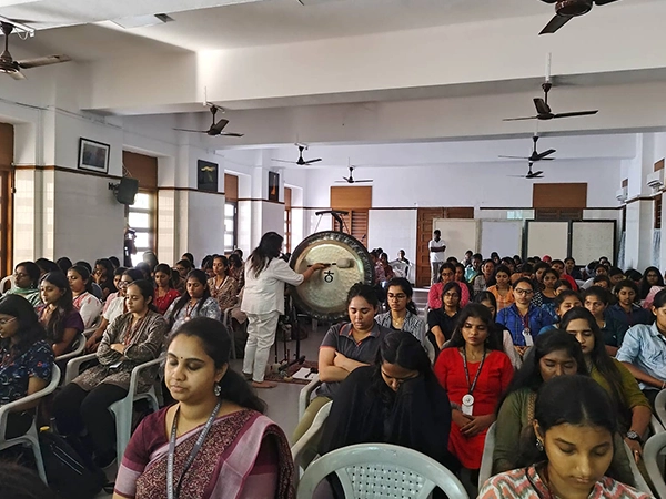 Participants seated in structured wellness circle participating in session conducted at Stella Maris