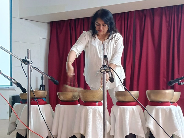 Facilitators deliver a guided wellness therapy session to student group on campus at Stella Maris