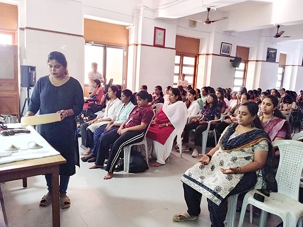 A structured yoga activity day hosted on campus with student participation at Stella Maris college .