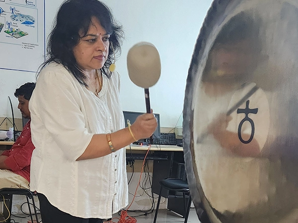 A demonstration-based wellness yoga camp organized in a lawn space for students within SRM premises.