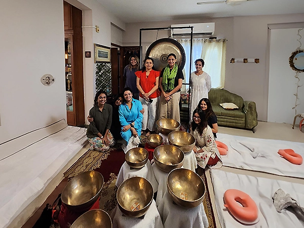 Yoga groups practice unity, mindfulness, and physical-mental balance for overall well-being.