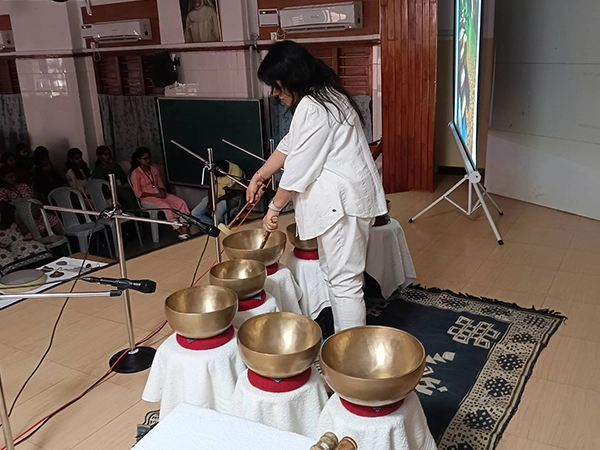 Proper yoga posture techniques demonstrated for students during wellness session at Stella Maris
